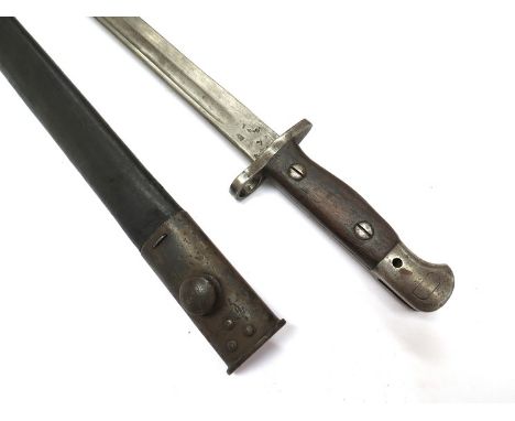 A British 1907 Pattern bayonet by Wilkinson with various stampings, with steel mounted scabbard