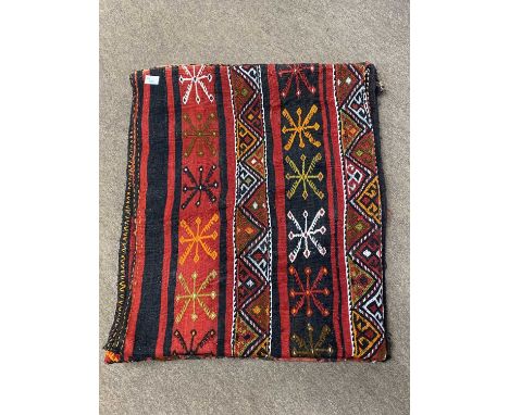 Two vintage carpet saddlebags, the largest 23 x 47 inches (2)