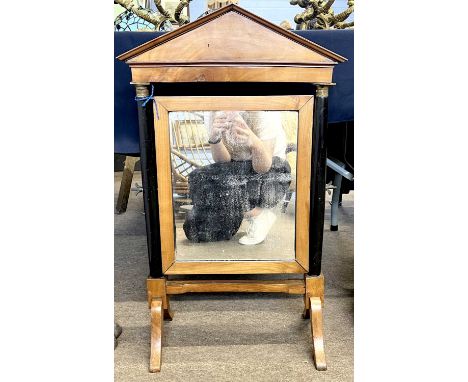 A Biedermeier style swing frame rectangular toilet mirror with architectural frieze