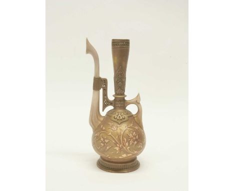 A Royal Worcester Persian influence ewer, the gold ground with scrolling floral design, 29cm high