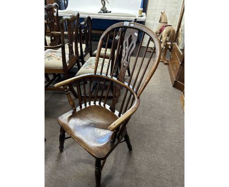 19th Century elm seated Windsor chair with stick back and pierced central splat over turned legs with a crynoline stretcher, 