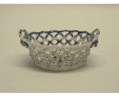 Lowestoft porcelain oval chestnut basket with a printed Worcester pine cone print, 20cm long