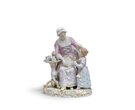 A Meissen group of 'Grandmother's Birthday', late 19th centuryModelled by E.A. Leuteritz, with a lady seated in an armchair, 