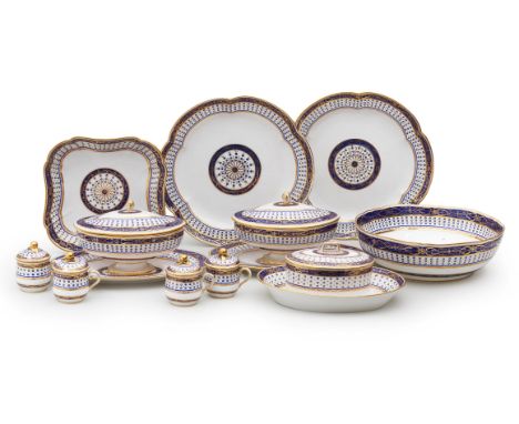 A Sèvres large part dinner service, circa 1792-93Decorated with a gilt radial motif with blue and gilt dots within a gilt-edg