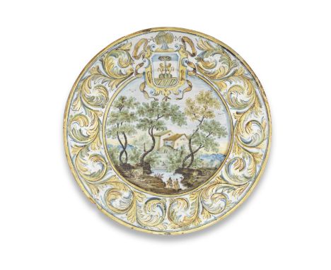 A Castelli maiolica armorial small dish, first half 18th centuryDecorated with a coat of arms and the initials A M, above a l