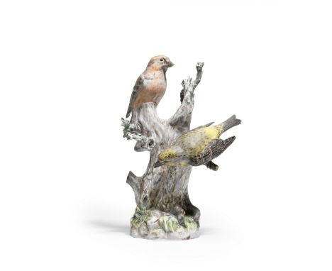 A Meissen group of crossbills, second half 19th centuryModelled by August Ringler with two crossbills perched on a pine tree 