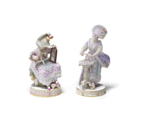 Two Meissen figures of ladies, together with a Meissen figure of a cavalier at a writing desk, late 19th centuryThe ladies af