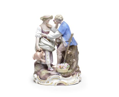 A Meissen group of gardeners, late 19th centuryAfter the 18th century model by M.V. Acier, a woman with a watering can next t