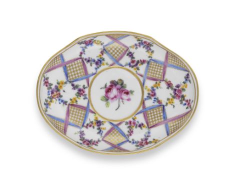 A Sèvres oval stand ('plateau ovale'), dated 1770Painted by Jean-Nicolas Le Bel with a pattern of blue and pink ribbons inter