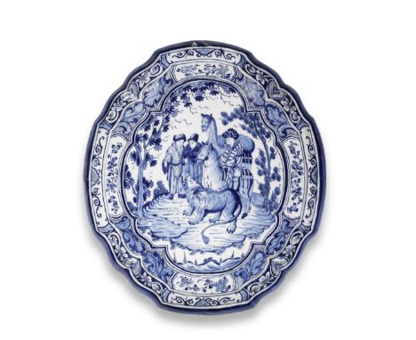 A Dutch Delft plaque, circa 1740-60Decorated with a central shaped oval cartouche depicting a chinoiserie landscape scene of 