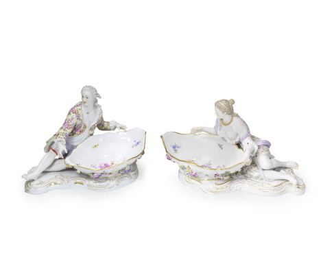 A pair of large Meissen figures with sweetmeat dishes, late 19th centuryAfter the 18th century models by J.J. Kaendler, each 