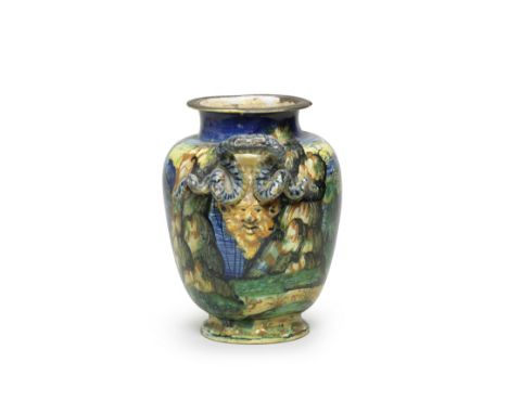 An Urbino maiolica wet drug jar attributed to the Fontana workshop, circa 1565-70With a serpent handle over a grotesque mask,