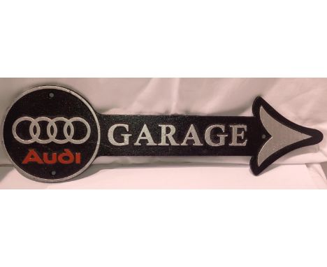 Cast iron Audi garage arrow plaque, W: 20 cm. P&amp;P Group 2 (£18+VAT for the first lot and £3+VAT for subsequent lots) 