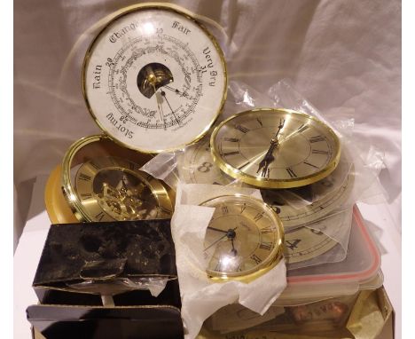 Two boxes of vintage effect brass coloured alarm clocks along with various clock pages and a box of mixed clock parts. Not av