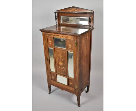 A Victorian Inlaid Rosewood Music Cabinet having Mirrored Raised Gallery Shelf, Panelled Door with Inlaid and Mirrors to Shel