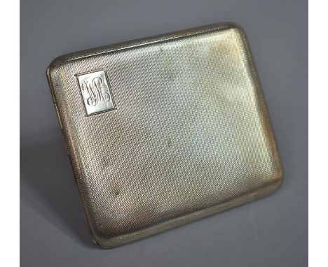 A Silver Cigarette Case with Engine Turned Decoration Birmingham Hallmark 1940. 129gms