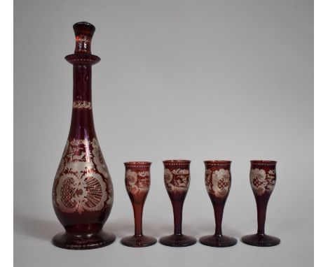 A Bohemian Ruby Glass Cordial Set to Comprise Decanter and Four Liqueurs all with Acid Etched Decoration with Deer and Lattic