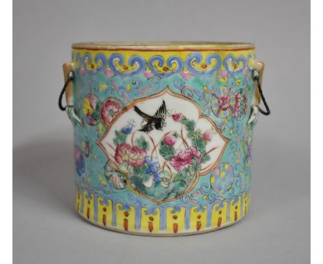 A Chinese Nyonya Porcelain Kamcheng Base on Blue Ground with Applied Pinks, Yellow and Teal Enamel Scrolls and Design Floral 