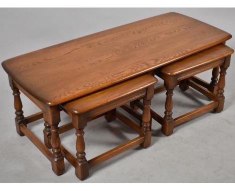 An Ercol Golden Dawn 'Trinity' Nest of Three Tables, 114cms Wide 