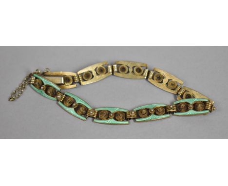 An Early 20th Century Continental Silver and Green Guilloche Enamel Sectional Bracelet, Each Panel having Double Filigree Rou