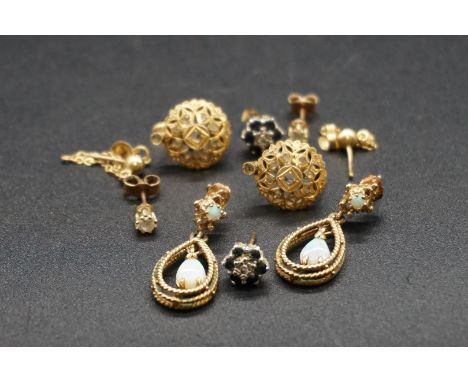 A pair of 9ct diamond ear studs; together with a pair of 9ct gold opal set pendant earrings; a pair of 9ct gold diamond and s