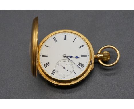 A Victorian 18ct gold half hunter stem wind pocket watch,&nbsp;50mm, hallmark London 1895. 
