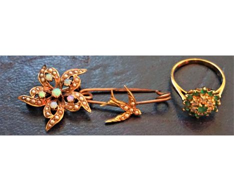 A yellow metal opal and seed pearl brooch, 24mm diameter; together with a swallow bar brooch; and a floral cluster ring stamp