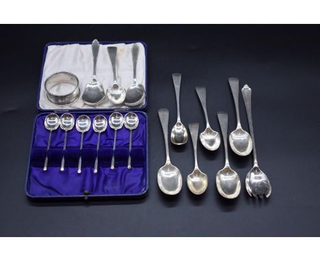 A cased set of six silver coffee spoons, by James Dixon &amp; Sons Ltd, Sheffield 1929; together with a silver napkin ring; a