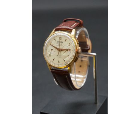 A vintage Apex 18k gold manual wind chronograph wristwatch, 36mm, No. 5076, on replacement brown leather strap. 