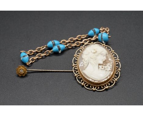 A 9ct gold and carved shell cameo brooch, 5cm high; together with a yellow metal bracelet, stamped 9ct, set interspersed turq