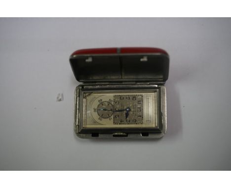 A rare 1930s Rolex rhodium plated and red lacquer 'Sporting Princess' manual wind purse watch, 40 x 25mm case, movement No. 7