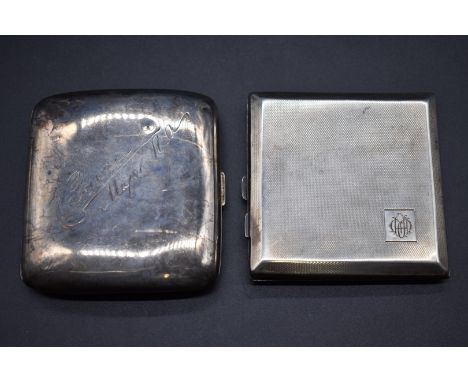 An engine turned silver cigarette case, by&nbsp;W T Toghill &amp; Co, Birmingham 1945, 9cm; together with another silver ciga