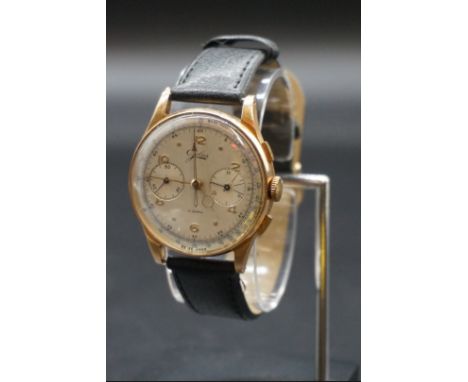 A 1950s Jolus 18k rose gold and gold capped manual wind chronograph wristwatch,&nbsp;37mm, No.21571, on replacement leather s