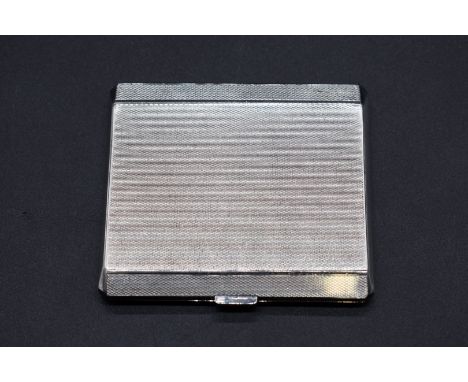 An engine turned silver cigarette case, by W N Ltd, Birmingham 1939, 8 x 7cm, 98g. 