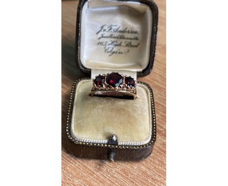  Sale Item:    9CT GOLD 3 STONE GARNET RING SIZE O  Vat Status:   No Vat   Buyers Premium:  This lot is subject to a Buyers P