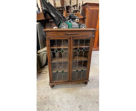  Sale Item:    OAK LEADED FRONT BOOKCASE (AF)   Vat Status:   No Vat   Buyers Premium:  This lot is subject to a Buyers Premi