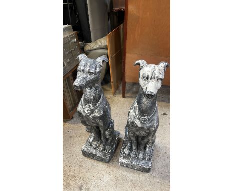  Sale Item:    2 PLASTIC / RESIN DOG ORNAMENTS (AF)  Vat Status:   No Vat   Buyers Premium:  This lot is subject to a Buyers 