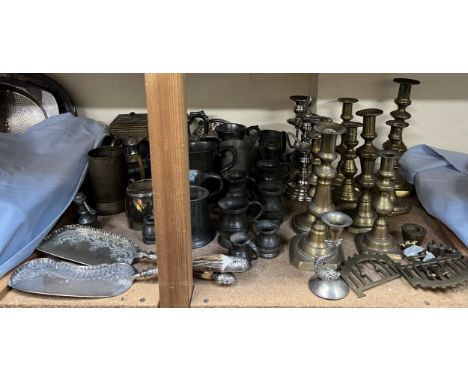 Assorted pewter tankards together with brass candlesticks, crumb scoops, candelabra etc 