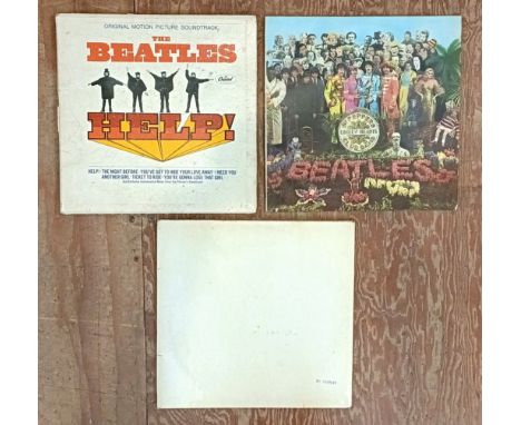 The Beatles, Help!, The White Album No 0189144 and Sgt Peppers Lonely Hearts Club Band (3)Well played and worn Sold with all 