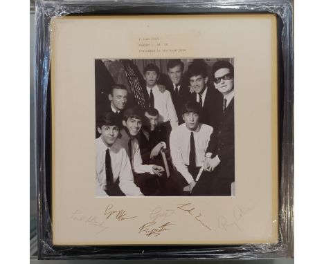 The Beatles and Roy Orbison photograph,  signed on mount 36 x 36 cm, label verso  Note: signatures have not been authenticate