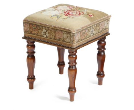 A Victorian mahogany stool, the needlework seat decorated with flowers, on baluster turned legs, 47.3cm high, 37.6cm square. 