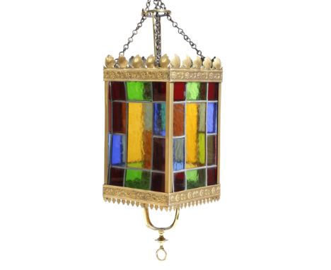 A late Victorian stained glass and gilt brass hall lantern, with leaf and flower decoration, together with brass rise and fal