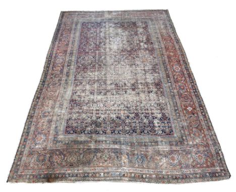 A Fereghan carpet, with all over herati pattern field, Hamadan area, early 20th century, 524.4 x 134.7cm.Click here to view t