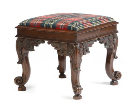 A Victorian Scottish walnut stool, with a tartan covered drop-in seat, above leaf and thistle carved cabriole legs and scroll