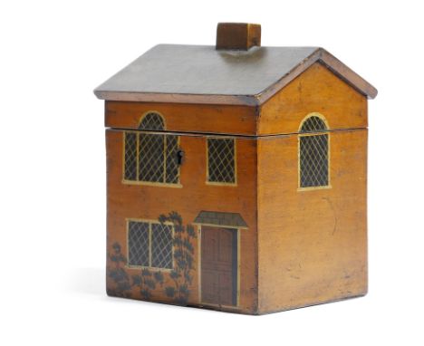 A 19th century painted tea caddy, in the form of a cottage, the hinged lid decorated with a tiled roof and a single chimney s