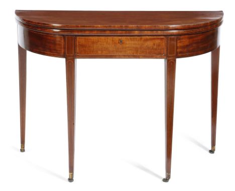 A George III mahogany tea table, inlaid with boxwood stringing, with a 'D' shaped fold-over top, above a frieze drawer, on sq