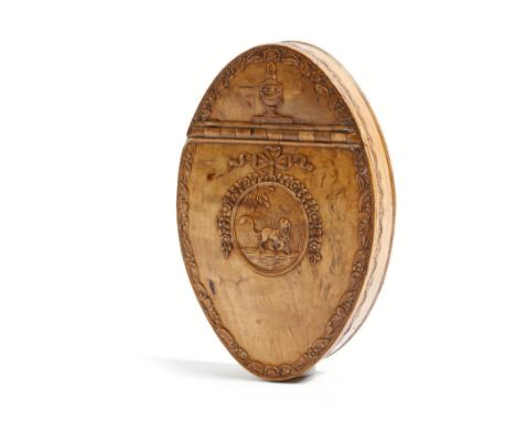 A late 18th century Scandinavian maple oval snuff box, relief carved with an urn and with a ribbon tied medallion depicting a