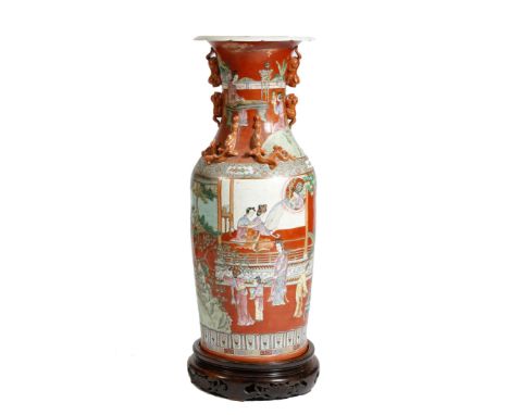 A large Chinese porcelain vase, of baluster shape, with applied lion's dog handles and chi dragons, painted with ladies in va