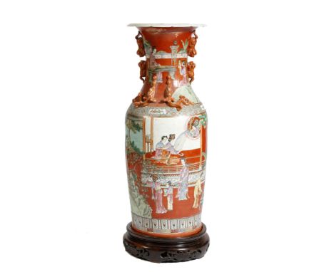 A large Chinese porcelain vase, of baluster shape, with applied lion's dog handles and chi dragons, painted with ladies in va