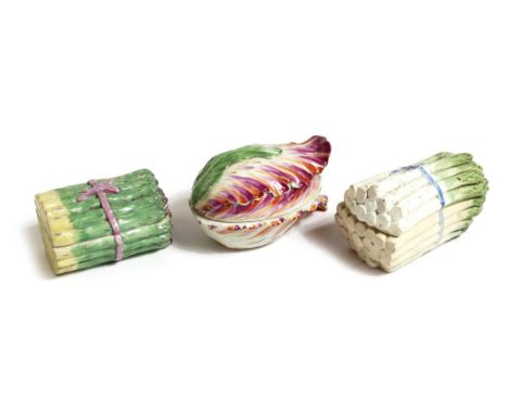 Two 19th century continental ceramic asparagus boxes, both tied with ribbons, one with impressed numbers '1058', the other wi